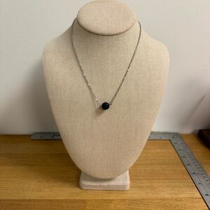 Silver tone chain with volcanic rock pendant